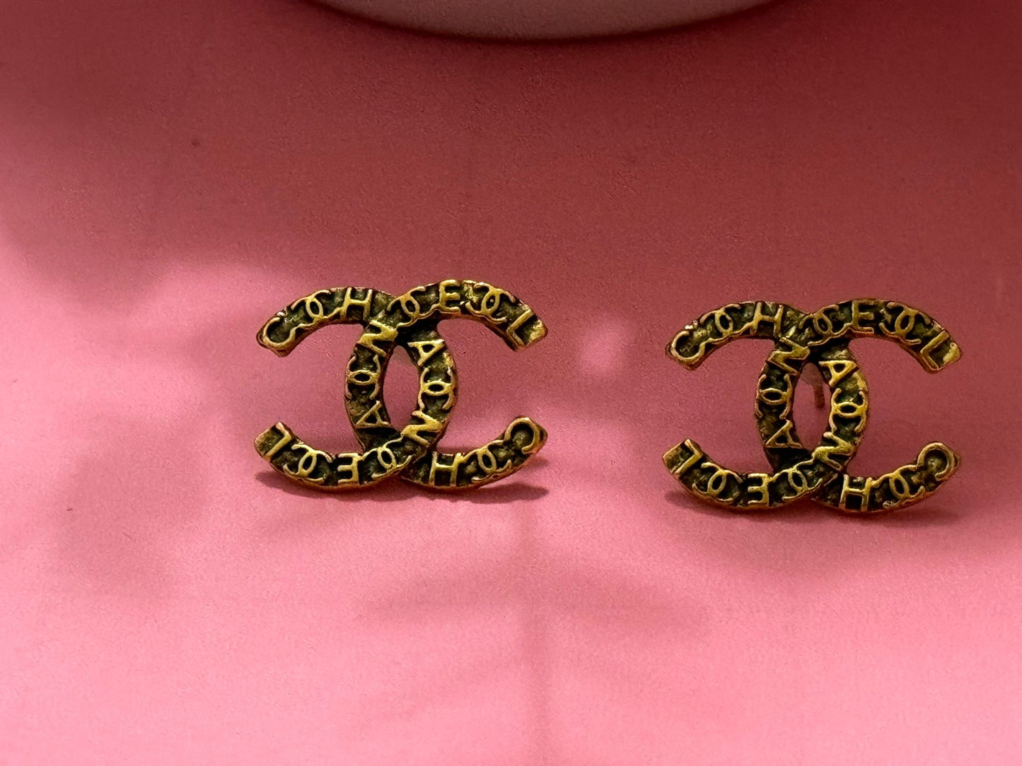 Black & gold cc all over me earrings