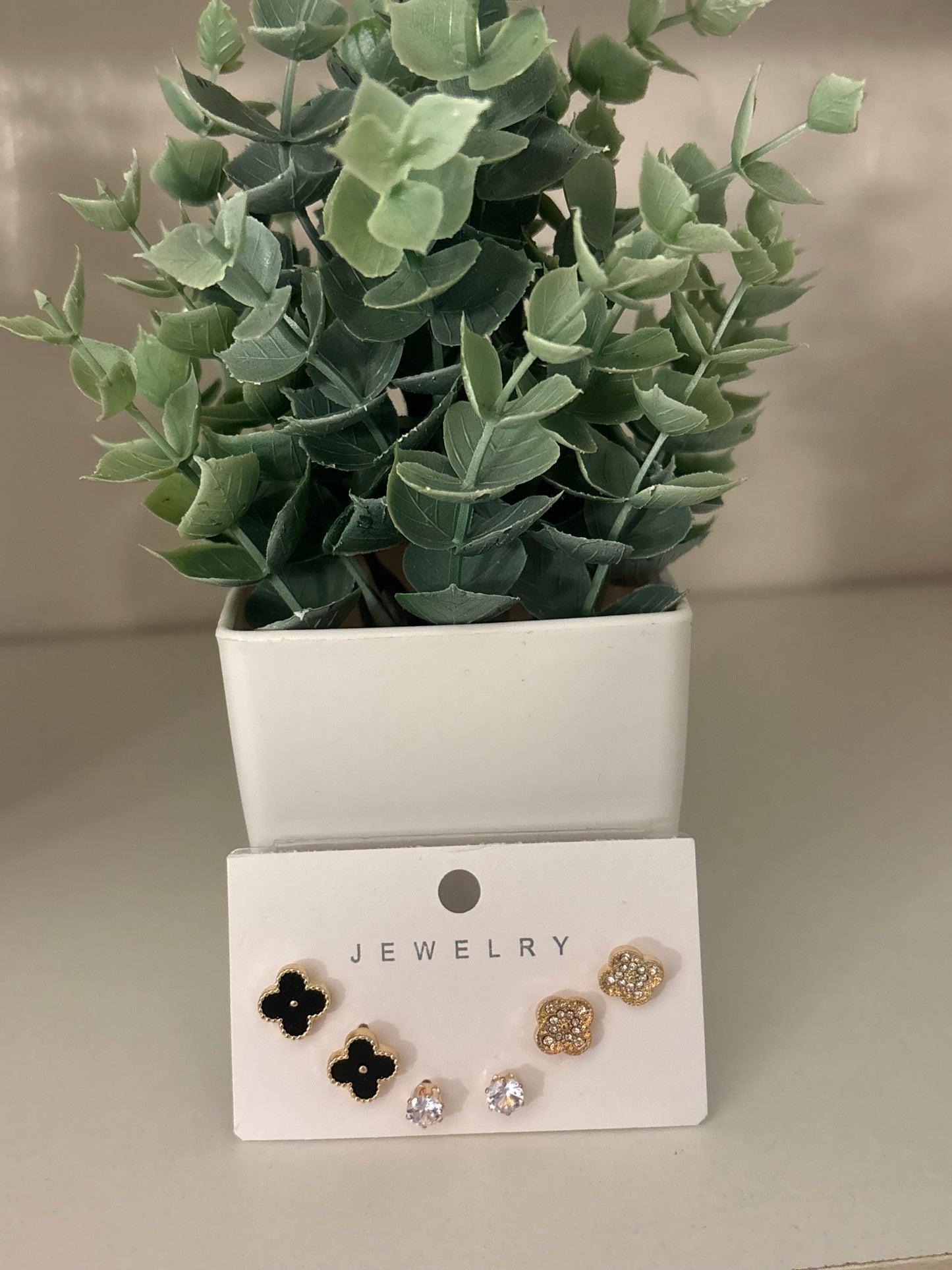 3 piece gold and black clover earrings