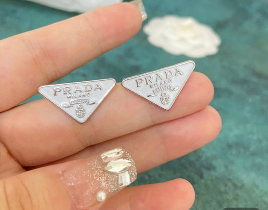 White Prada earrings