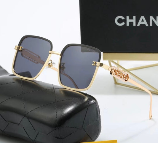 Channel with gold sunglasses