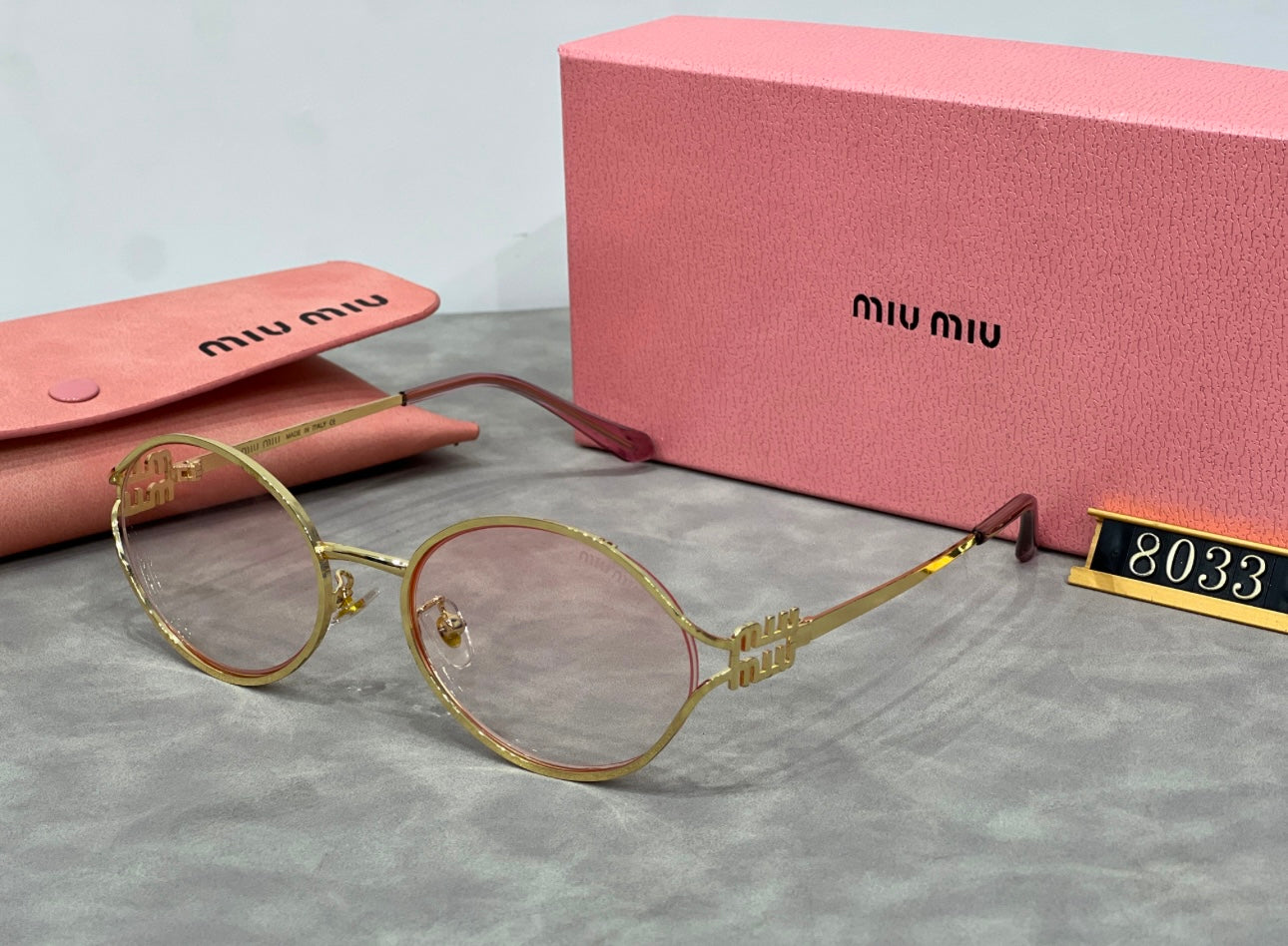 Light pink miu miu sunglasses