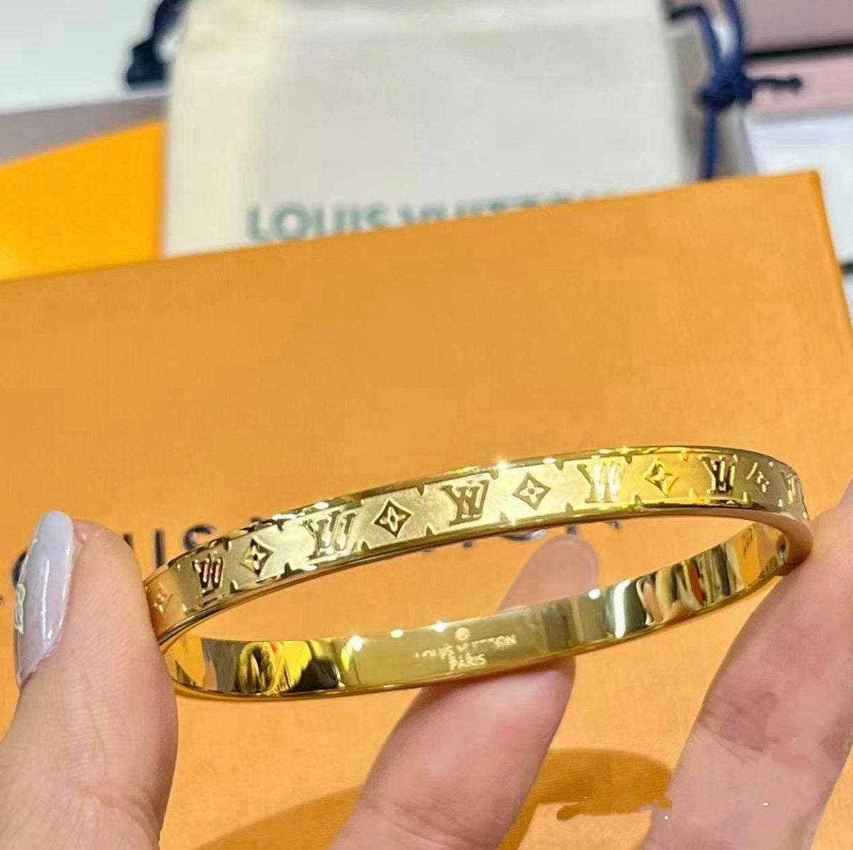 LV gold bangel
